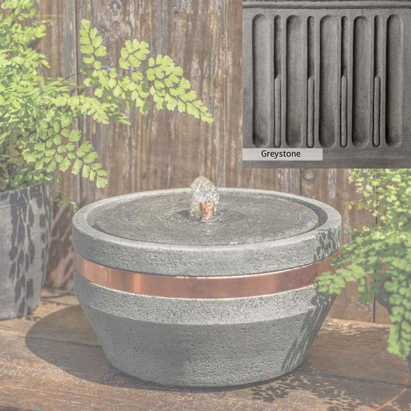 Greystone Patina for the Campania International M-Series Bevel Fountain, a classic gray, soft, and muted, blends nicely in the garden.