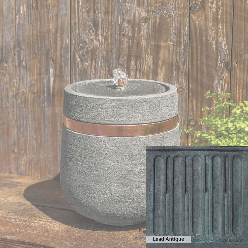 Lead Antique Patina for the Campania International M-Series Parabola Fountain, deep blues and greens blended with grays for an old-world garden.