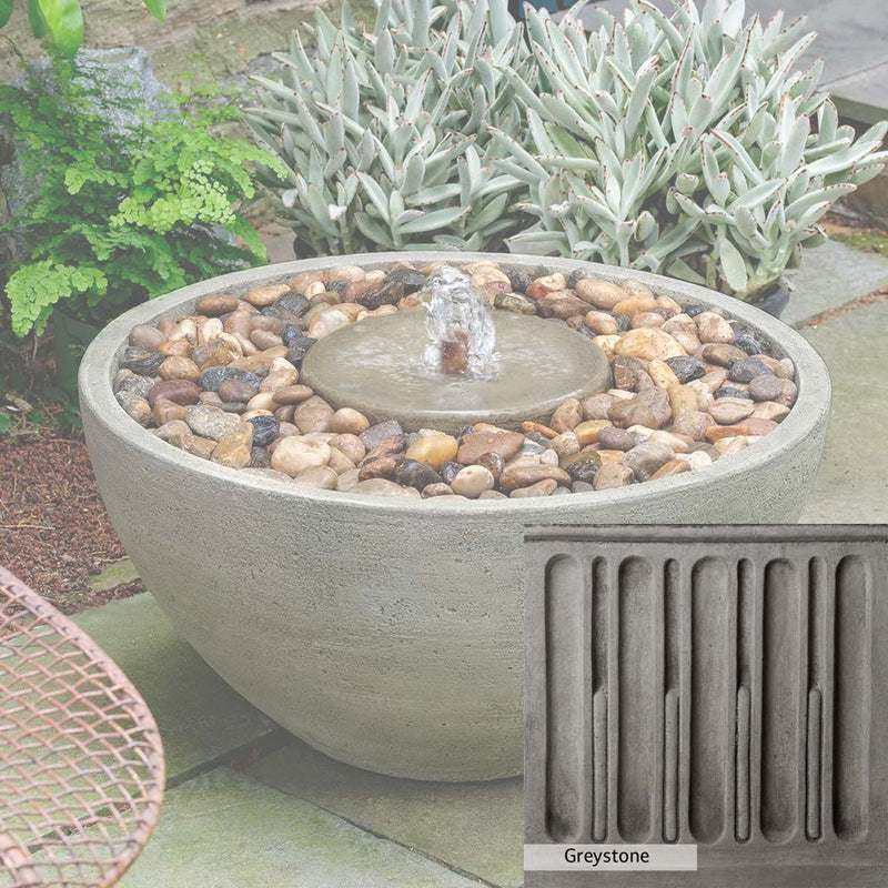 Greystone Patina for the Campania International Portola Pebble Fountain, a classic gray, soft, and muted, blends nicely in the garden.