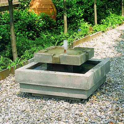 Campania International Escala Fountain is made of cast stone by Campania International and shown in the Greystone Patina