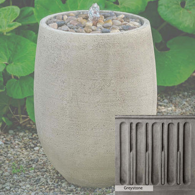 Greystone Patina for the Campania International Bebel Pebble Tall Fountain, a classic gray, soft, and muted, blends nicely in the garden.