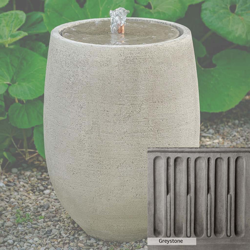 Greystone Patina for the Campania International Bebel Tall Fountain, a classic gray, soft, and muted, blends nicely in the garden.