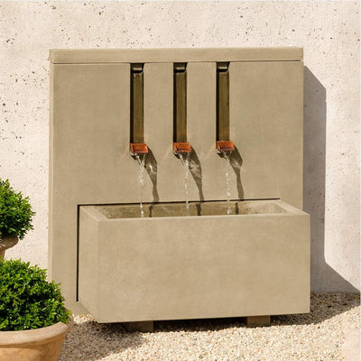 Campania International Mondrian Fountain, adding interest to the garden with the sound of water. This fountain is shown in the Greystone Patina.