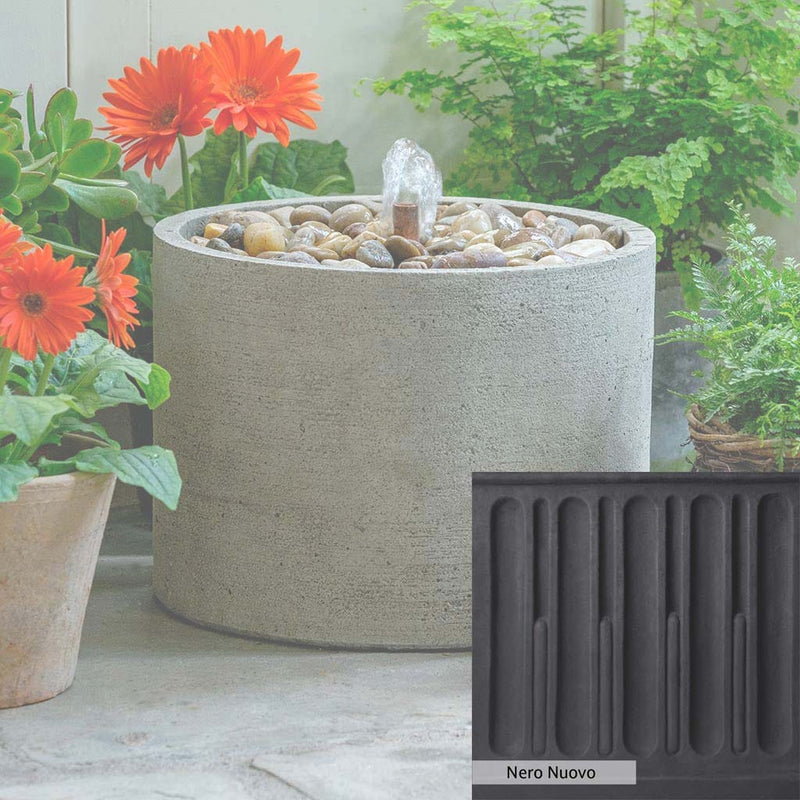 Nero Nuovo Patina for the Campania International Salinas Low Pebble Fountain, bold dramatic black patina for the garden.