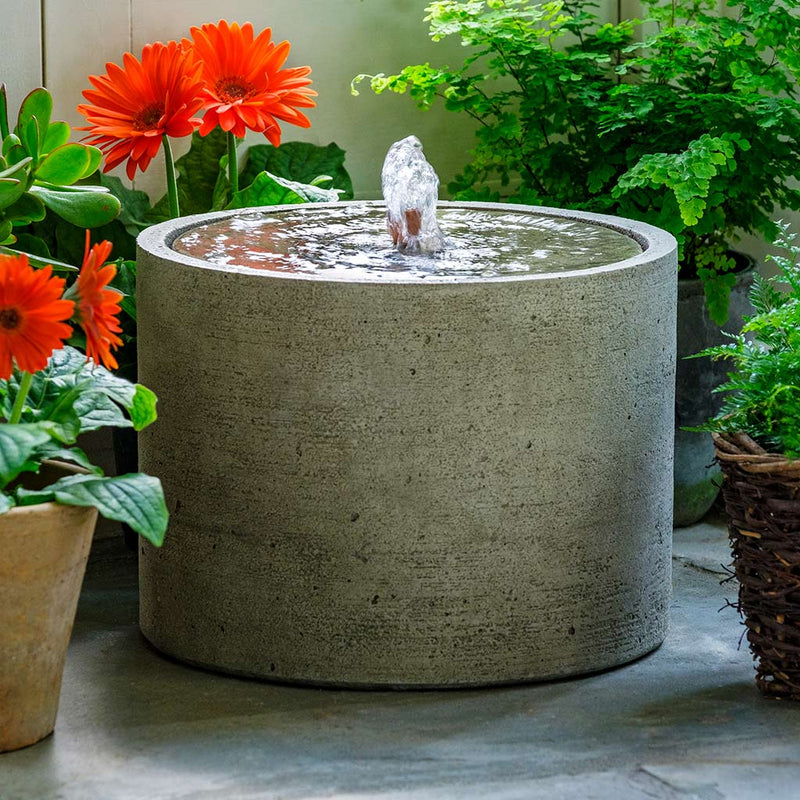 Campania International Salinas Low Fountain is made of cast stone by Campania International and shown in the Greystone Patina