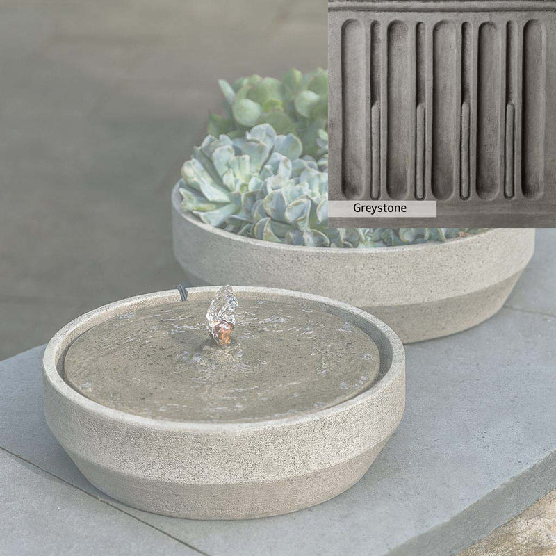 Greystone Patina for the Campania International Beveled Yuma Fountain, a classic gray, soft, and muted, blends nicely in the garden.