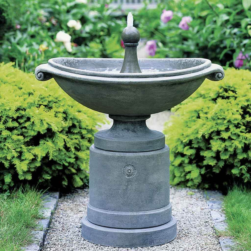 Campania International Medici Ellipse Fountain is made of cast stone by Campania International and shown in the Greystone Patina