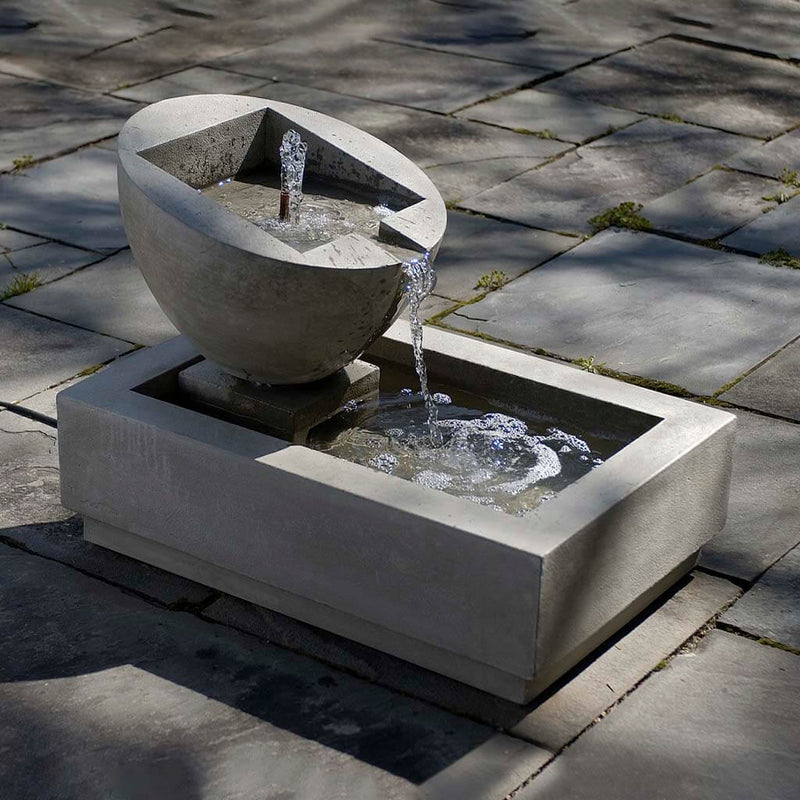 Campania International Genesis II Fountain is made of cast stone by Campania International and shown in the Verde Patina