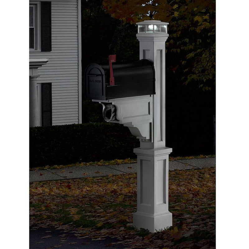 The Mayne Solar Cap, in the white finish, installed on mailbox post, lighting up the night.