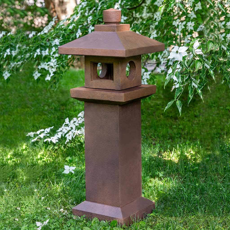 Campania International Kyoto Pagoda Statue, set in the garden to adding charm an meaning. The statue is shown in the Pietra Nuova Patina.