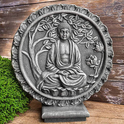 Campania International Celestial Buddha Rondelle Statue, set in the garden to adding charm an meaning. The statue is shown in the Alpine Stone Patina.