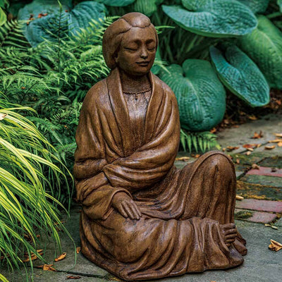 Campania International Ayumi Statue, set in the garden to adding charm an meaning. The statue is shown in the Pietra Nuova Patina.