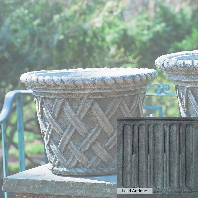 The Lead Antique Patina for the Campania International English Weave Medium Planter, aged blue and grey layered to give the look of a classic antique lead patina.