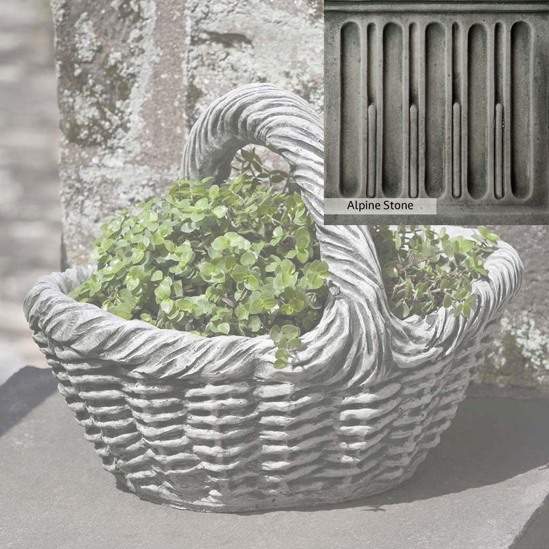 Alpine Stone Patina for the Campania International Basket with Handle Small Planter, a medium gray with a bit of green to define the details.