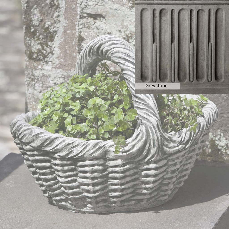Greystone Patina for the Campania International Basket with Handle Small Planter , a classic gray, soft, and muted, blends nicely in the garden.