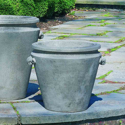 Campania International Scroll Handle Medium Planter is shown in the Greystone Patina. Made from cast stone.