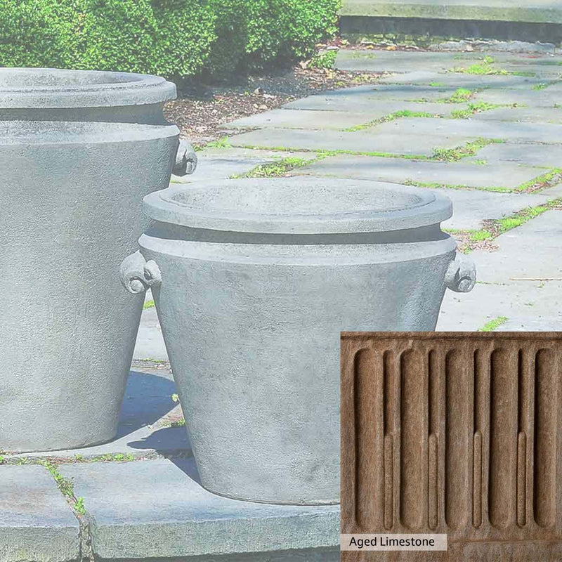 Aged Limestone Patina for the Campania International Scroll Handle Medium Planter, brown, orange, and green for an old stone look.