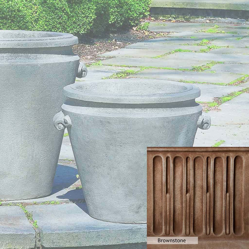 Brownstone Patina for the Campania International Scroll Handle Medium Planter, brown blended with hints of red and yellow, works well in the garden.