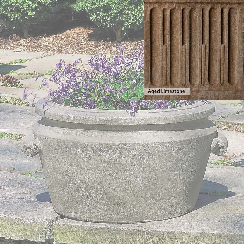 Aged Limestone Patina for the Campania International Scroll Handle Tub Planter, brown, orange, and green for an old stone look.