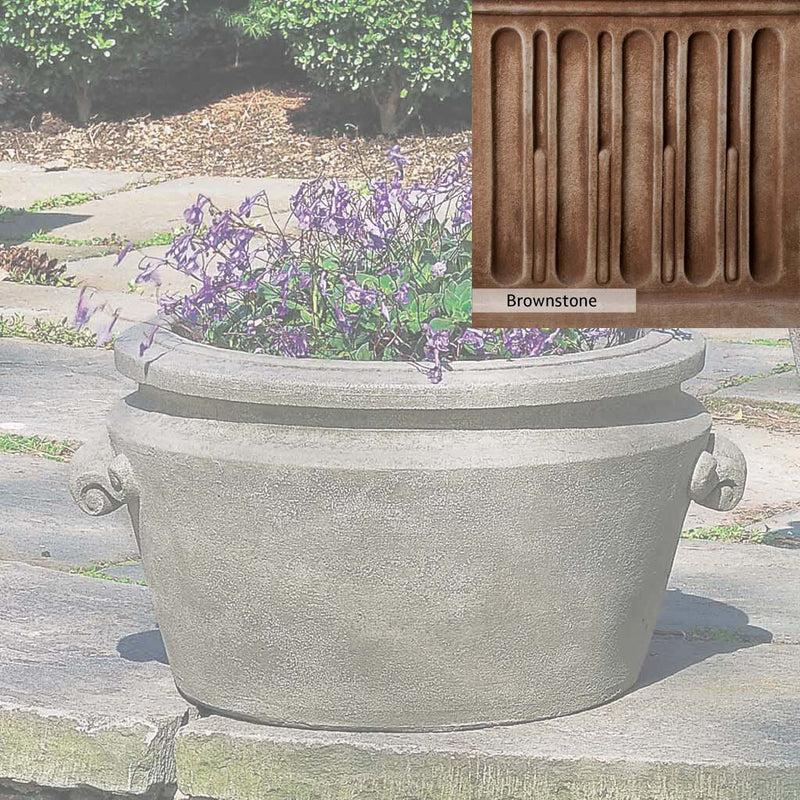 Brownstone Patina for the Campania International Scroll Handle Tub Planter, brown blended with hints of red and yellow, works well in the garden.