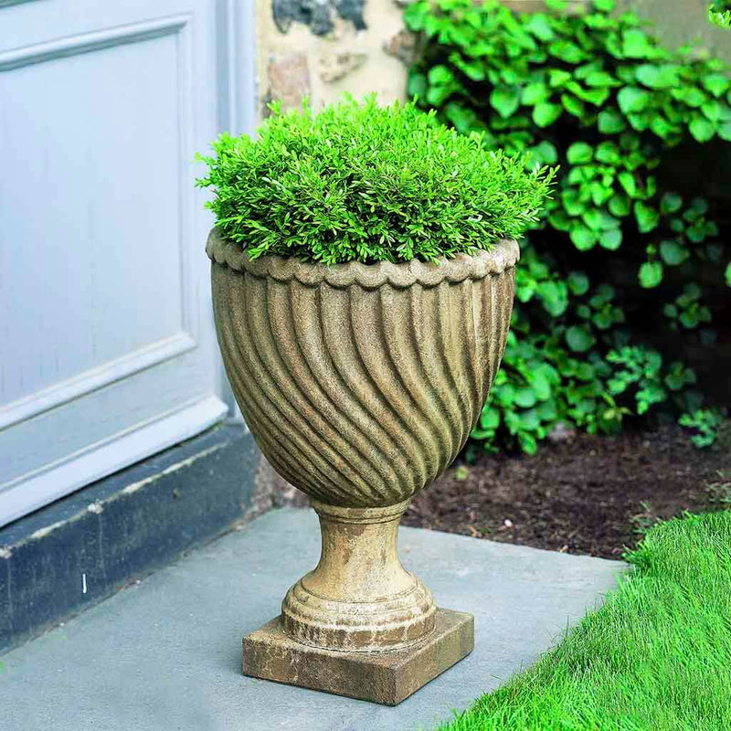  Campania International Ravenna Urn is shown in the Age Limestone Patina. Made from cast stone.