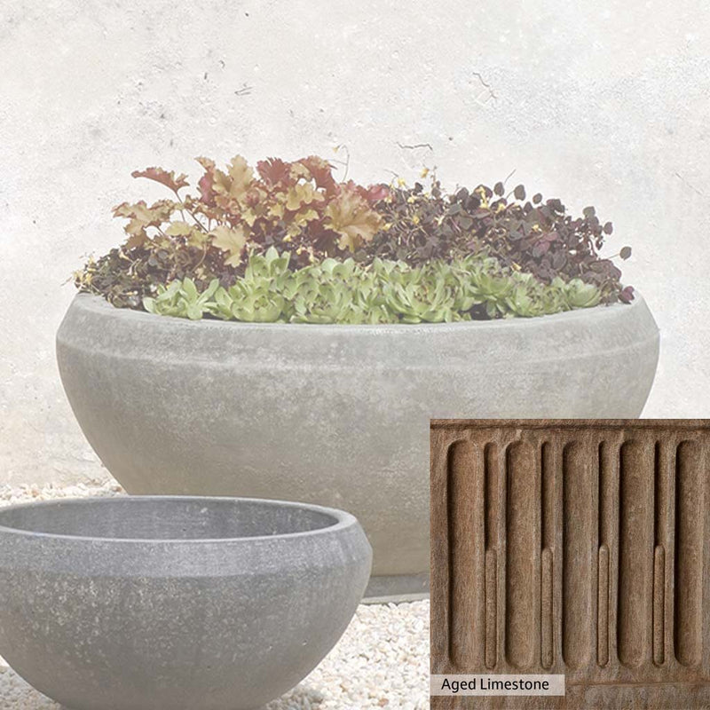 Aged Limestone Patina for the Campania International Giulia Large Planter, brown, orange, and green for an old stone look.