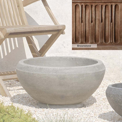 Brownstone Patina for the Campania International Giulia Medium Planter, brown blended with hints of red and yellow, works well in the garden.