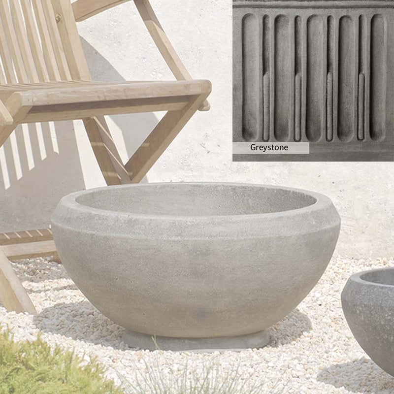 Greystone Patina for the Campania International Giulia Medium Planter , a classic gray, soft, and muted, blends nicely in the garden.