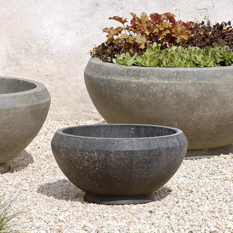 Campania International Giulia Small Planter is shown in the Nero Nuovo Patina. Made from cast stone.