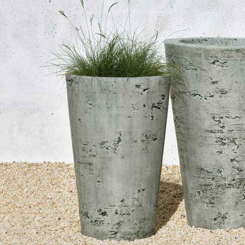 Campania International Saguaro Medium Planter is shown in the Alpine Stone Patina. Made from cast stone.