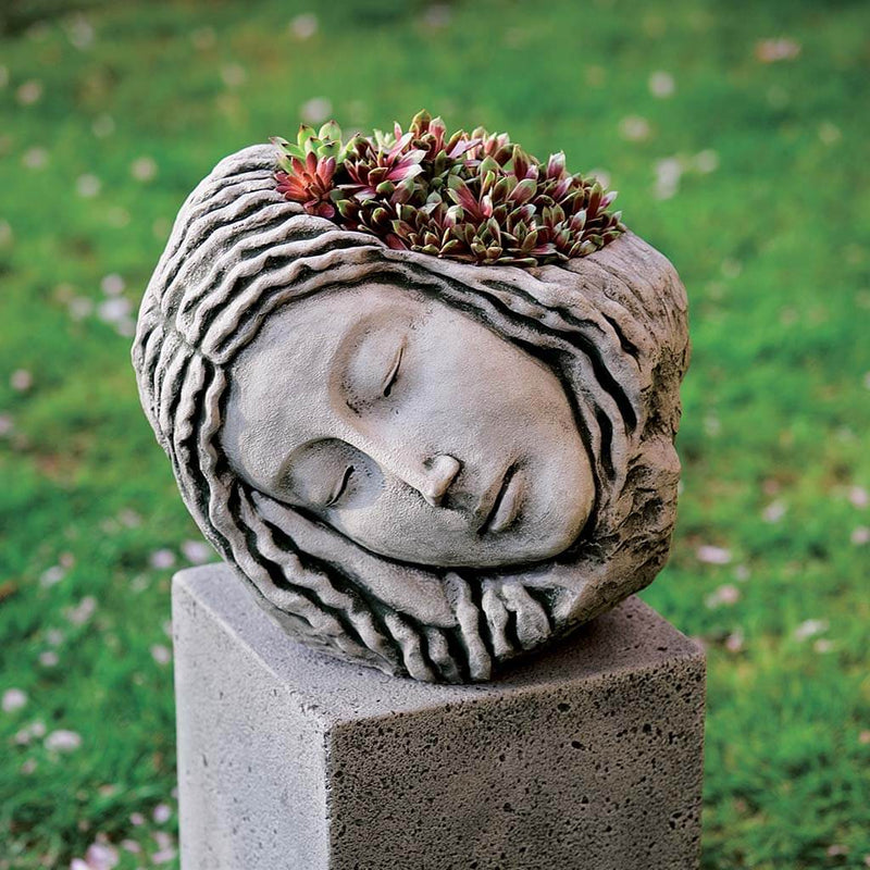 Campania International Sleeping Maiden Planter is shown in the Alpine Stone Patina. Made from cast stone.