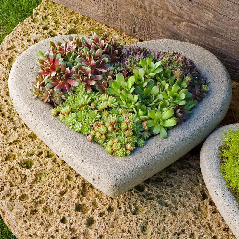 Campania International Large Heart Planter is shown in the Verde Patina. Made from cast stone.