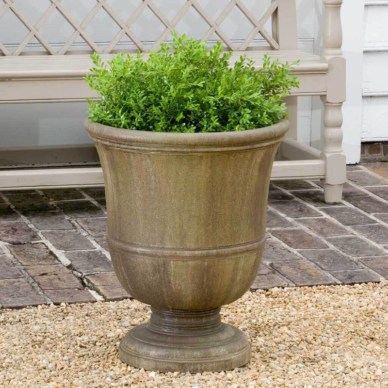 Campania International Williamsburg Orangery Urn is shown in the Age Limestone Patina. Made from cast stone.