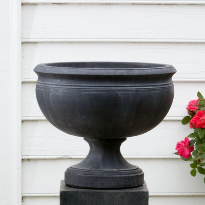 Campania International Williamsburg Plantation Urn is shown in the Nero Nuovo Patina. Made from cast stone.