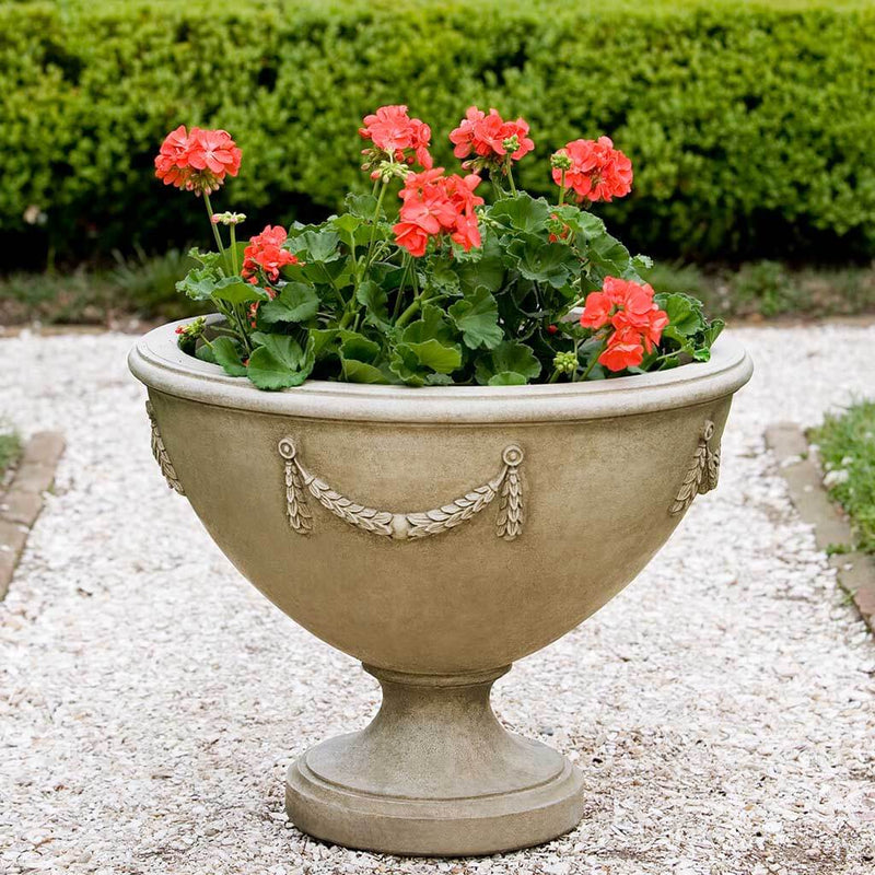 Campania International Williamsburg Neoclassic Urn is shown in the Verde Patina. Made from cast stone.