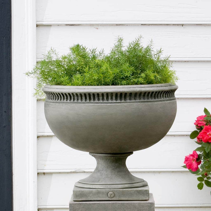 Campania International Williamsburg Tayloe House Urn is shown in the Alpine Stone Patina. Made from cast stone.