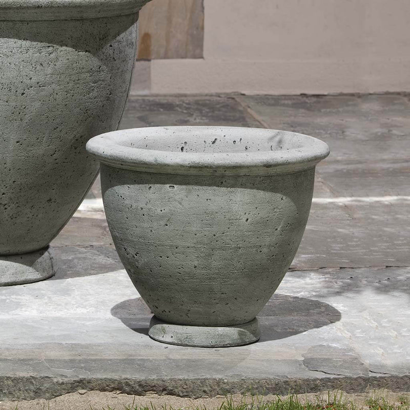Campania International Berkeley Medium Planter is shown in the Alpine Stone Patina. Made from cast stone.