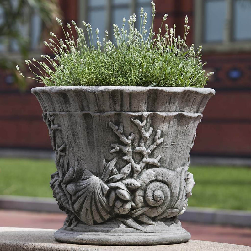 Campania International Smithsonian Chesapeake Urn is shown in the Alpine Stone Patina. Made from cast stone.