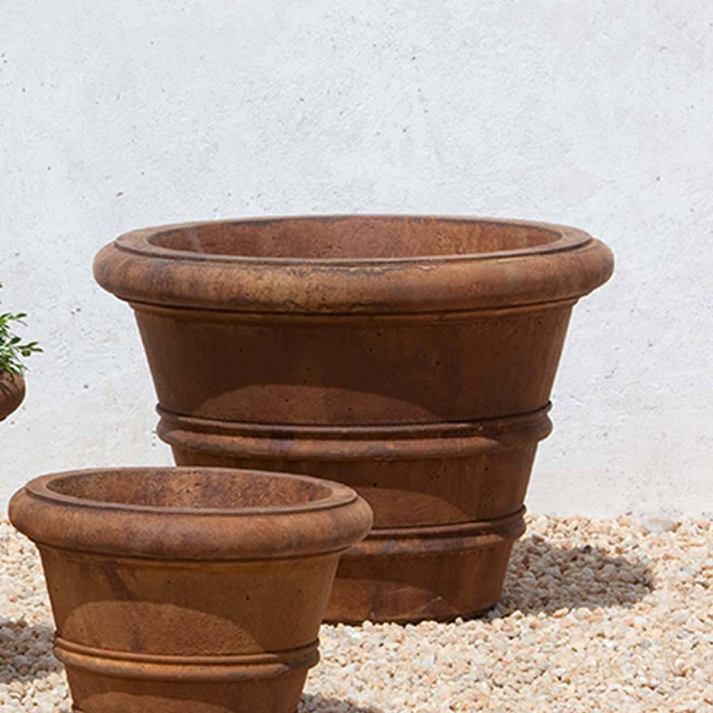 Campania International Classic Rolled Rim 18.25-inch Planter is shown in the Ferro Rustico Nuovo Patina. Made from cast stone.
