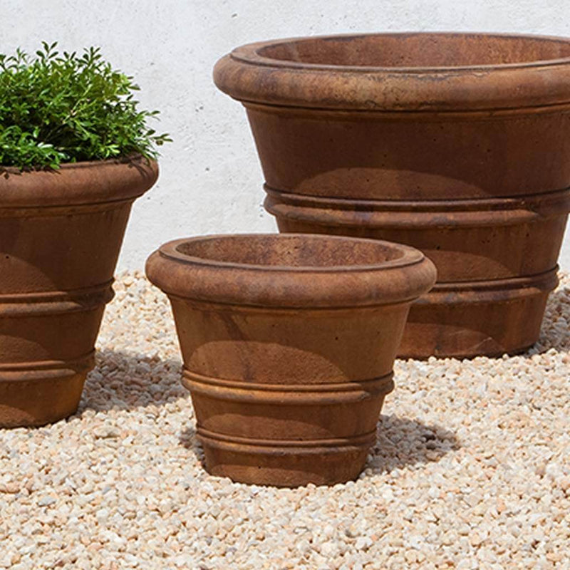 Campania International Classic Rolled Rim 11.5-inch Planter is shown in the Ferro Rustico Nuovo Patina. Made from cast stone.