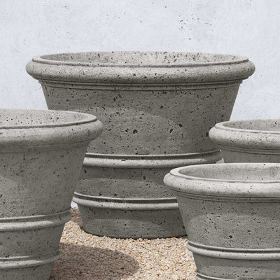 Campania International Rustic Rolled Rim 35.5 inch is shown in the Alpine Stone Patina. Made from cast stone.