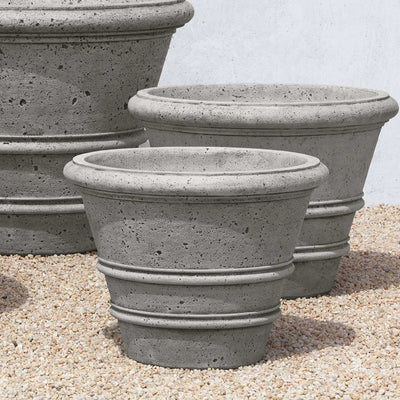 Campania International Rustic Rolled Rim 24 inch is shown in the Alpine Stone Patina. Made from cast stone.