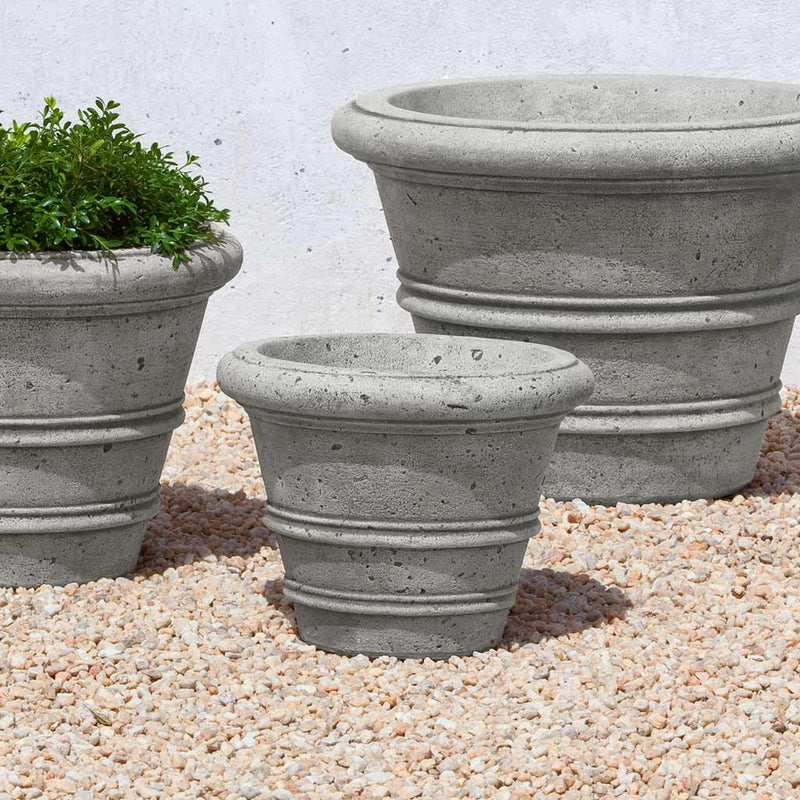 Campania International Rustic Rolled Rim 11.5 inch is shown in the Alpine Stone Patina. Made from cast stone.