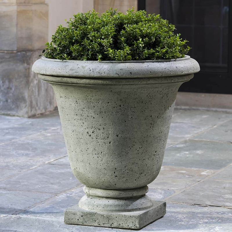  Campania International Rustic Hampton Urn is shown in the Alpine Stone Patina. Made from cast stone.