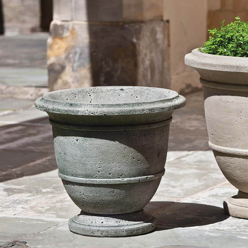 Campania International Relais Small Urn is shown in the Alpine Stone Patina. Made from cast stone.