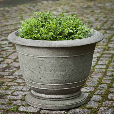 Campania International Padova Medium Planter is shown in the Alpine Stone Patina. Made from cast stone.