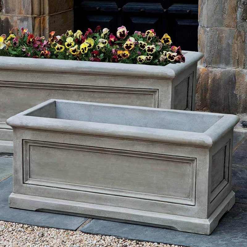 Campania International Orleans Window Medium Box is shown in the Alpine Stone Patina. Made from cast stone.