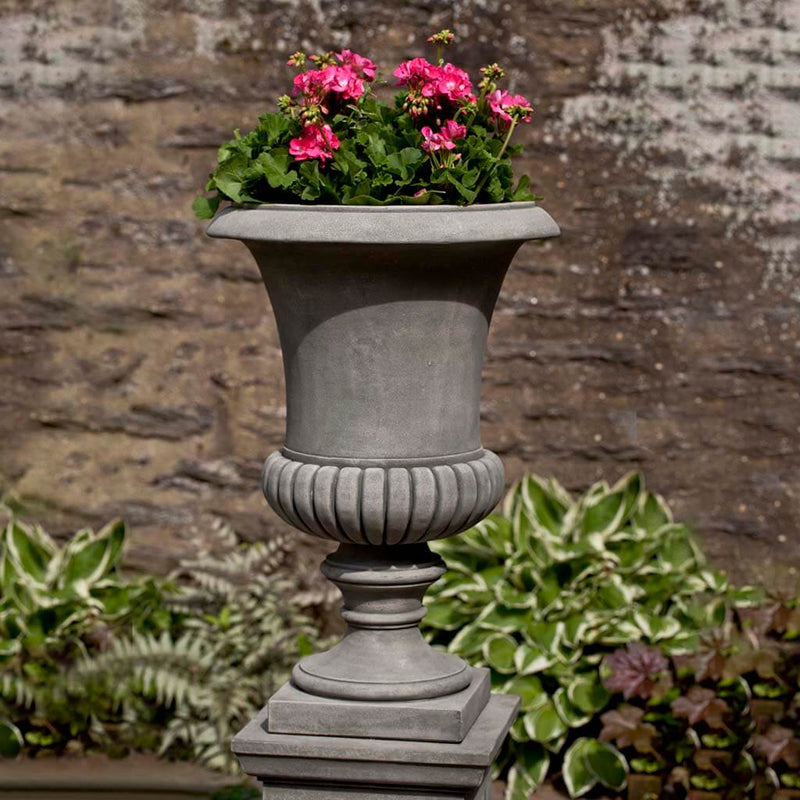 Campania International Kent Urn is shown in the Alpine Stone Patina. Made from cast stone.