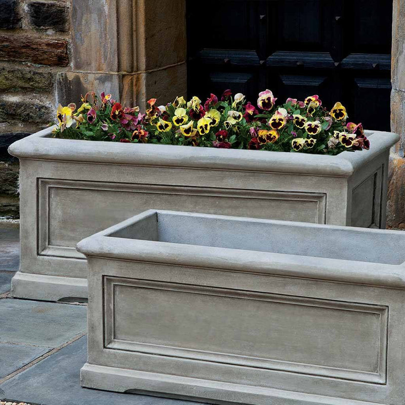 Campania International Orleans Window Box, Large is shown in the Alpine Stone Patina. Made from cast stone.