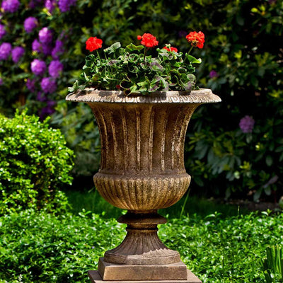 Campania International Smithsonian Classical Urn is shown in the Age Limestone Patina. Made from cast stone.